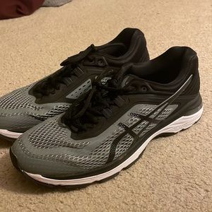 Asics brand shoe which is grey and black with a white bottom. Men’s size 9 1/2